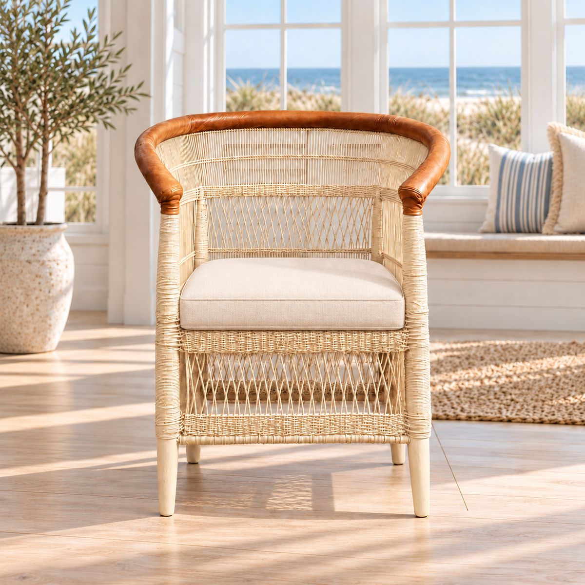 Corniche Traditional Malawi cane chair in cream with tan leather arm and foam seat cushion